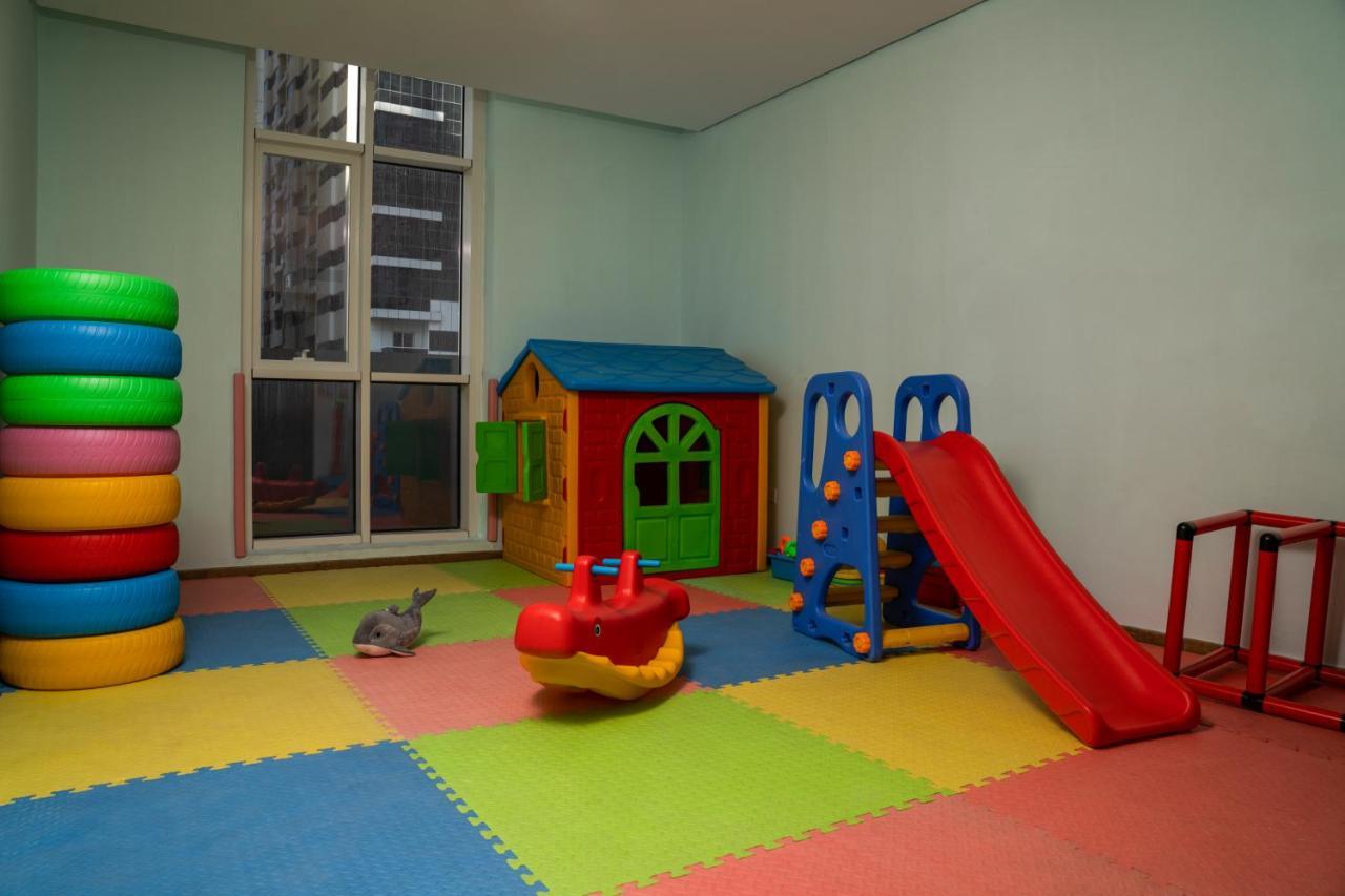 Hotel Pullman Schardscha Exterior foto A playroom