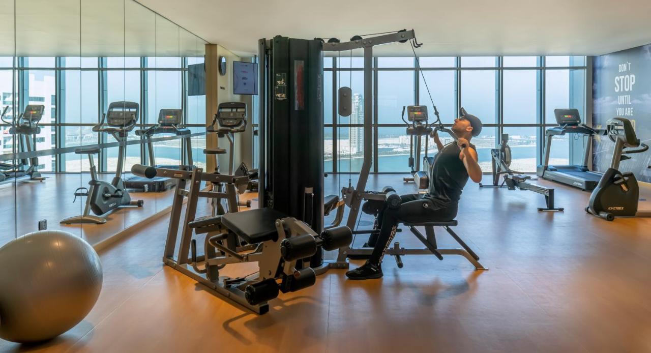 Hotel Pullman Schardscha Exterior foto The gym at the hotel